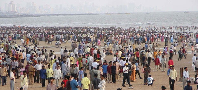 many tourists and locals travel to Juhu Beach and visit India's coast line
