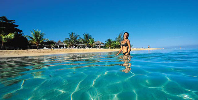 blue water and white beach Jamaica island travels