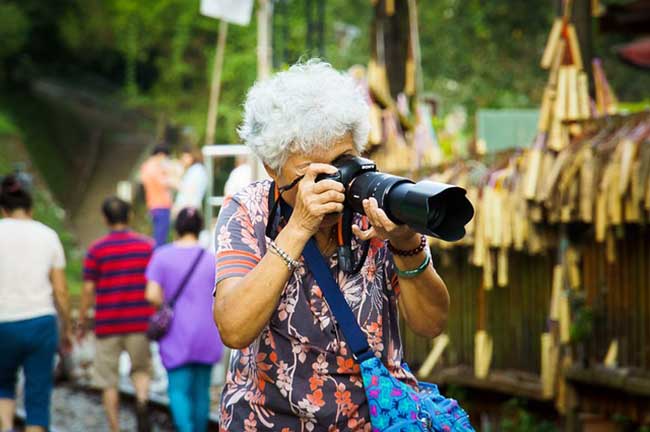 grandma with sony camera gadgets