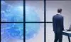 A futuristic office scene with a professional at a glass desk surrounded by holographic displays showing network diagrams and AI code streams, illustrating the disruption of traditional IT certification models.