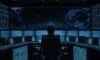 A cybersecurity professional stands in a high-tech operations center, facing a wall of monitors showing a glowing global network map being overshadowed by a dark, looming silhouette.
