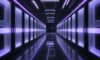 A photorealistic wide shot of a futuristic data center with rows of sleek black server racks illuminated by blue and violet neon lights, featuring organized fiber optic cables on a polished floor.