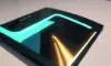 A close-up of a sleek, metallic-framed foldable smartphone partially unfolded on a marble table, displaying a vibrant neon gaming interface in a modern apartment.