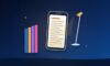 Phone showing an e-book page next to a row of books and a reading lamp