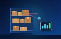 Warehouse shelf with boxes, a barcode scanner beam and a stock chart on a tablet