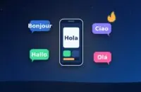 Phone with a flashcard app surrounded by speech bubbles saying hello in five languages and a streak flame