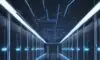 A cinematic wide shot of a massive, futuristic data center at night with glowing blue LED accents and rows of high-tech server racks visible through glass panels.
