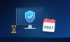Monitor with a security shield, a calendar showing 2027 and an hourglass